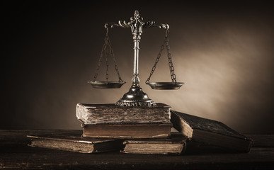 Old silver scale and books still life