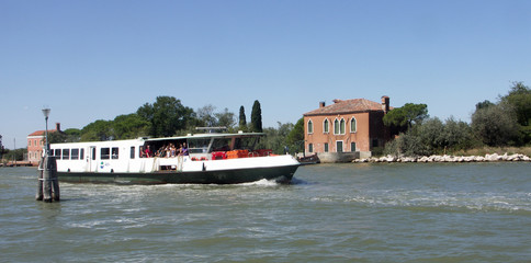  Vaporetto approach the Island of Burano Venice.