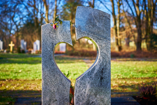 Gravestone With Heart Withered Rose / Tombstone With Heart On Graveyard