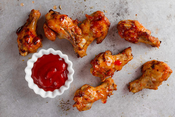 Grilled chicken wings with sauce