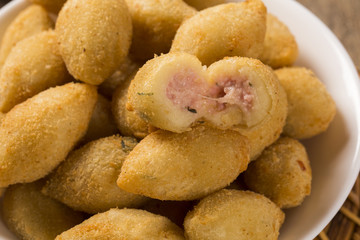 Brazilian snack fried with cheese ham