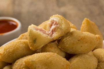 Brazilian snack fried with cheese ham