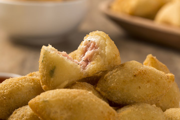Brazilian snack fried with cheese ham