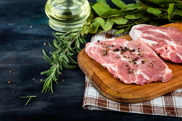 fresh meat with aromatic herbs and spices, cooking concept.