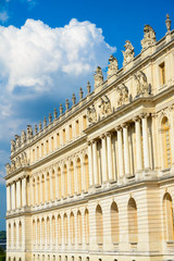 Fototapeta na wymiar Chateau De Versailles / Palace Of Versailles. This is a detailled view of the left side wing of the palace of Versailles, which belongs to the UNESCO world heritage.