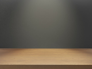 wooden desk with gray wall under light effect