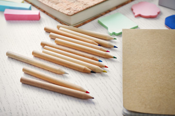 Naklejka premium Notebooks with stationery on a white table