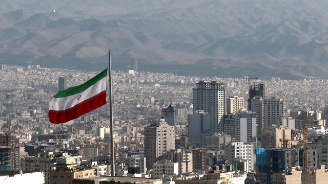 TEHRAN, IRAN JANUARY 2015: Iranian flag in the middle of Tehran city.