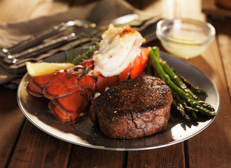 steak and lobster surf & turf meal with asparagus
