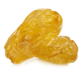 Yellow sultanas raisins close-up isolated on a white background.