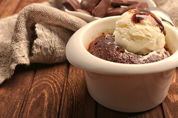 Served table of chocolate lava cake with ice-cream