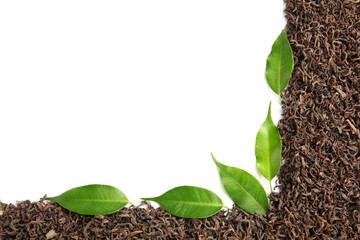 Frame of dry tea with green leaves, isolated on white