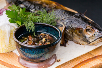 fried fish with fresh herbs and lemon