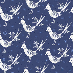 Seamless vector folk pattern. Vintage pattern with white birds on a blue background.