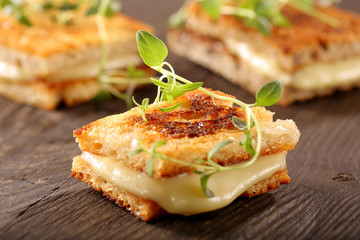 Fresh toast with cheese and herbs