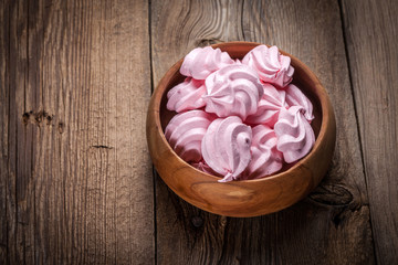 Pink meringue cookies.