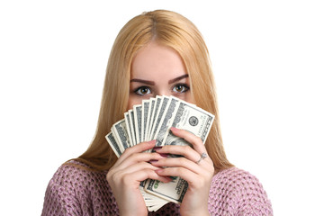 girl showing hundred dollar bills spread out like a fan isolated on white background