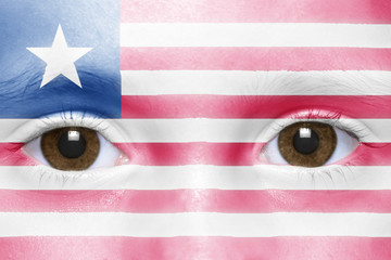 human's face with liberian flag