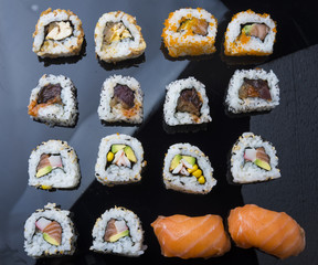 Sushi set isolated on black background