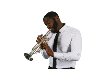 Naklejka premium Darksinned musician with a trumpet.