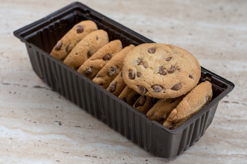 Brown biscuits cookies with chocolate parts