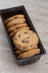 Brown biscuits cookies with chocolate parts