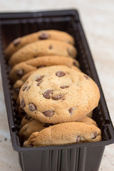 Brown biscuits cookies with chocolate parts