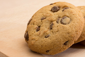 Brown biscuits cookies with chocolate parts