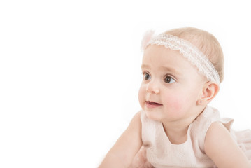 Portrait of lovely young girl exploring the surroundings shot against white background with copy paste