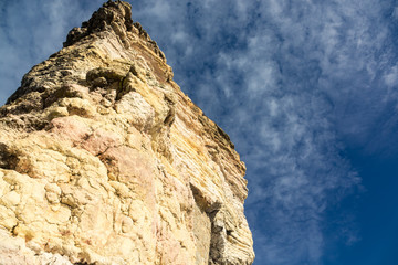 Sandstone Rock on a Background of Blue Sky