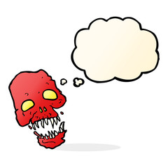 cartoon scary skull with thought bubble