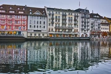 Amazing reflection of old town in The Reuss River, City of Luzern, Switzerland