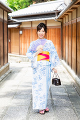Fototapeta na wymiar portrait of japanese woman wearing kimono