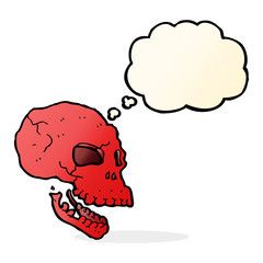 cartoon spooky skull with thought bubble