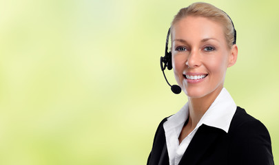 Smiling agent woman with headsets.