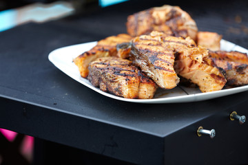 Salmon fish roast on barbecue grill.