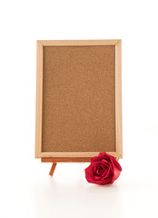 red rose with empty board