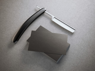 Razor with stack of business cards