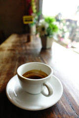 cup of coffee on table in cafe