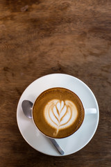 Hot art Latte Coffee in the table
