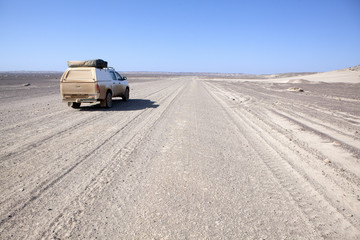 Driving through the Skeleton Coast of Namibia.