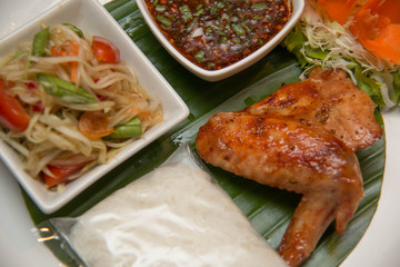 Green papaya salad, grilled chicken and sticky rice