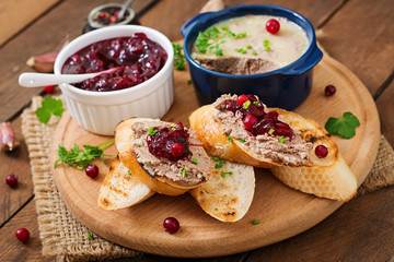 Chicken liver pate with cranberry sauce, served with croutons