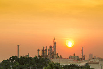 Oil refinery at sunset, petrochemical plant - factory