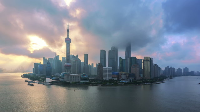 Time-lapse, China Shanghai, Pudong Skyline and Huangpu River at Sunrise.