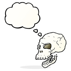 cartoon spooky skull with thought bubble