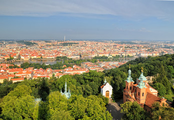 Fototapeta na wymiar Aerial view of Prague City and Saint Lawrence Cathedral
