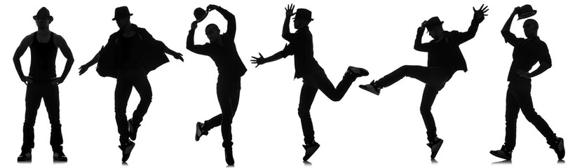 Silhouettes of dancers in dancing concept