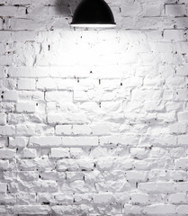 texture of brick whitewashed wall with lamp on top