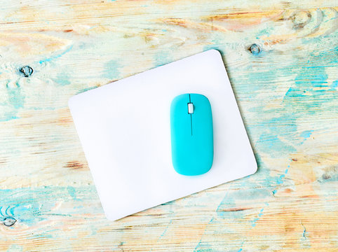 white pad with blue mouse